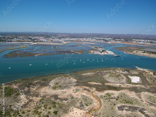 Tavira (Portugal) ciudad portuguesa de la costa del Algarve  que desemboca en las lagunas del parque natural de Ría Formosa. Fotografia aerea con Drone