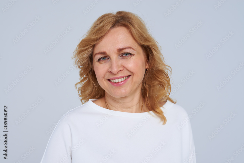 Close-up portrait of smiley mature woman Close-up portrait of smiley mature woman
