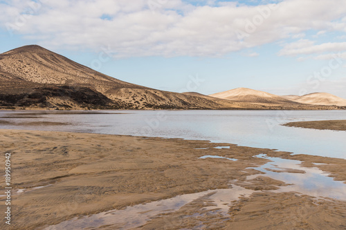 Landscape of mountains with water reflection in Fuerteventura, Canary Islands