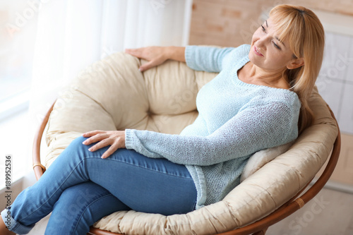 Happy mature woman relaxing...