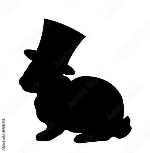 Black silhouette of fluffy rabbit or hare wearing magic cylinder top hat