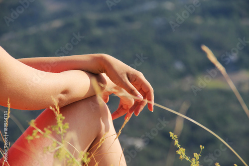 Beautiful hands of  woman and nature