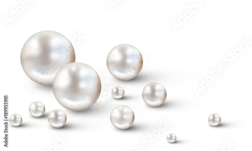 Many small and big white pearls on white background