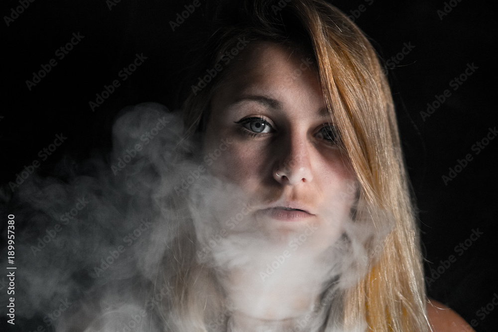 portrait with some smoke of a female blond model