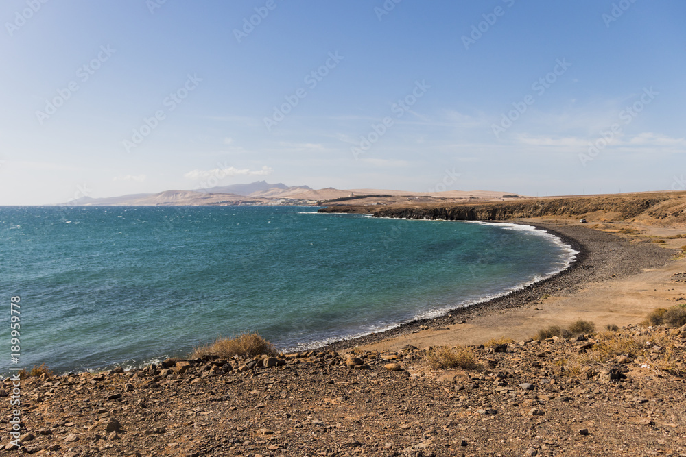 Landscape of beach from above with mountains in the horizon in Fuerteventura, Canary Islands