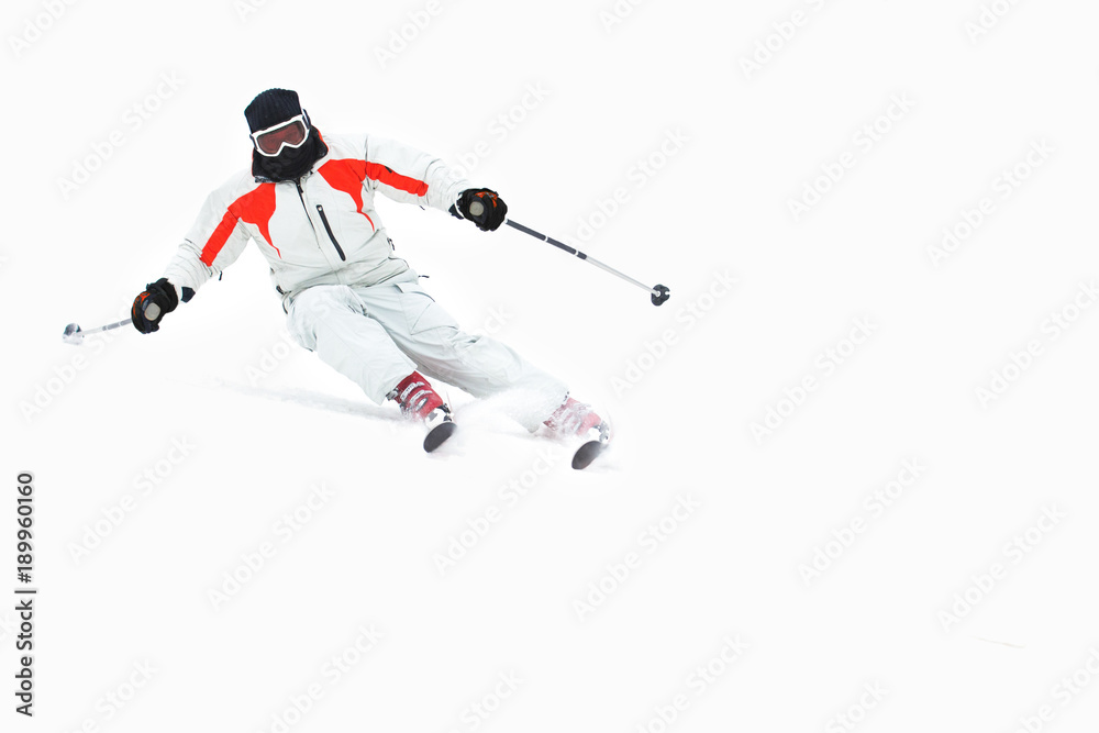 Alpine skier skiing downhill