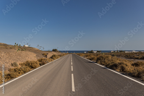Empty Road towards the sea in Fuerteventura, Canary Islands