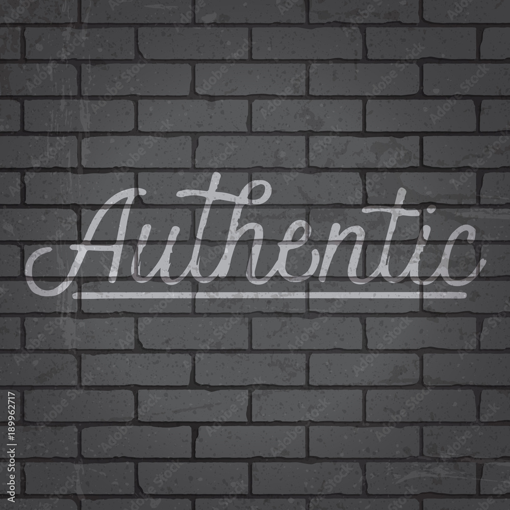 Hand drawn lettering slogan on brick wall background Hand drawn lettering slogan on brick wall background