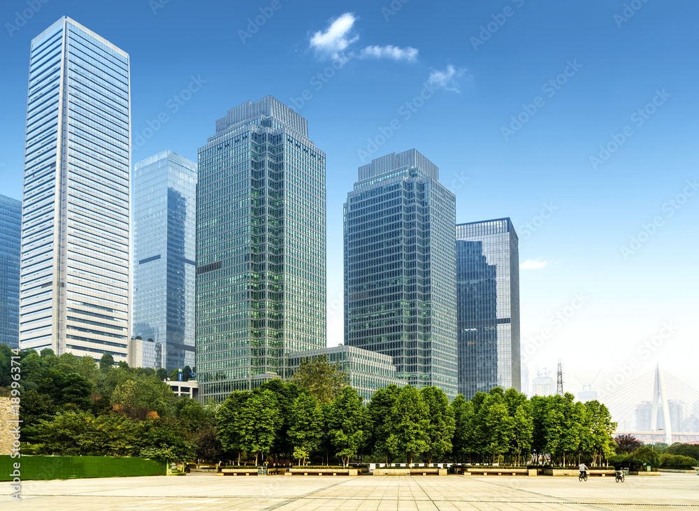 Panoramic skyline and buildings with empty concrete square floor