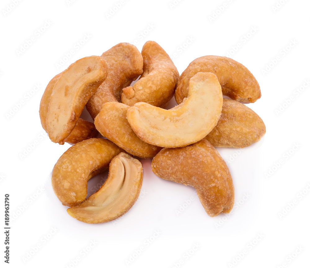 Roasted cashew nuts on white background Roasted cashew nuts on white background