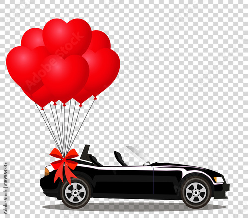 Black cabriolet car with bunch of red helium heart shaped balloo photo