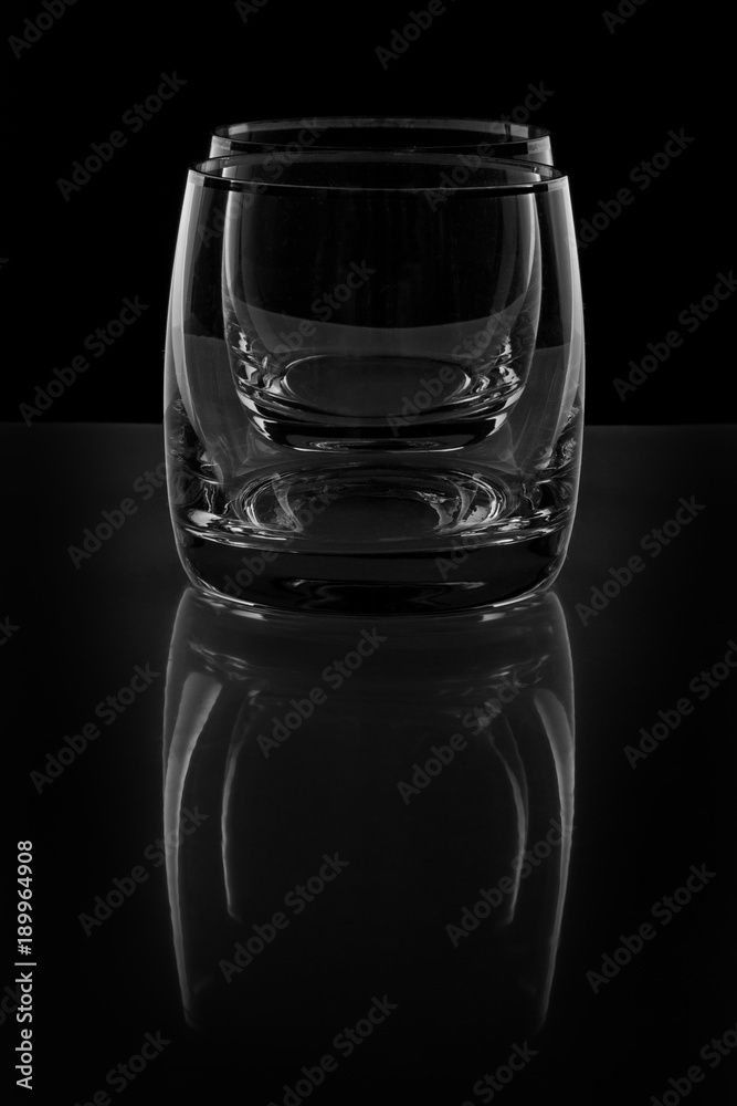 Two empty glass on black Two empty glass on black