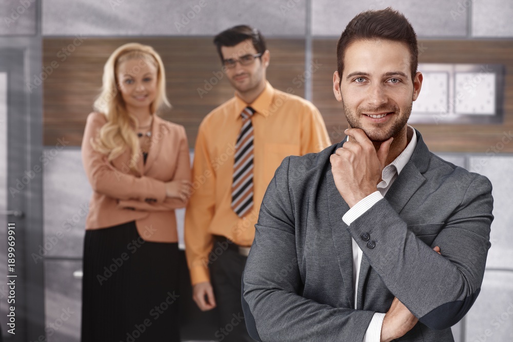 Portrait of handsome smiling businessman Portrait of handsome smiling businessman