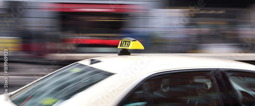 german taxi cab speeding in the city
