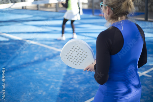 two women 47 years old playing Paddle tennis