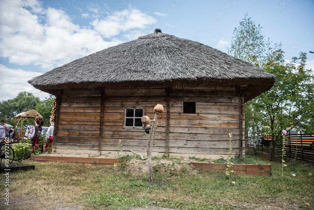 Sorochinsky Fair. Mirgorod. Old wooden Ukrainian house.