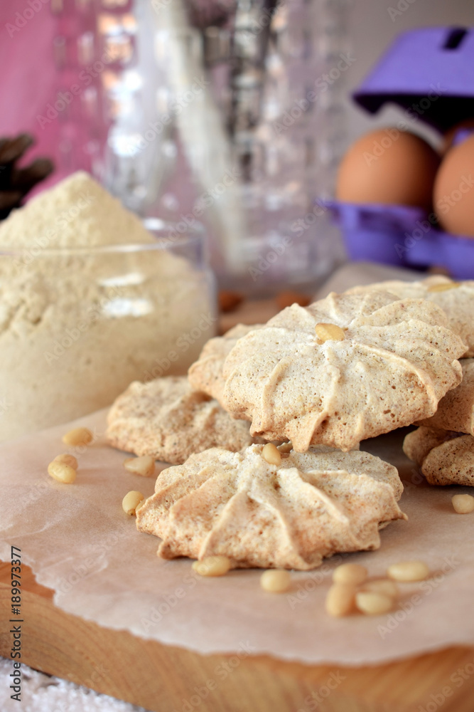 Meringue cookies with pine nuts and almonds