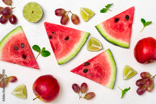 Fototapeta Naklejka Na Ścianę i Meble -  Fresh watermelon and fruits on white background. Pattern of wate