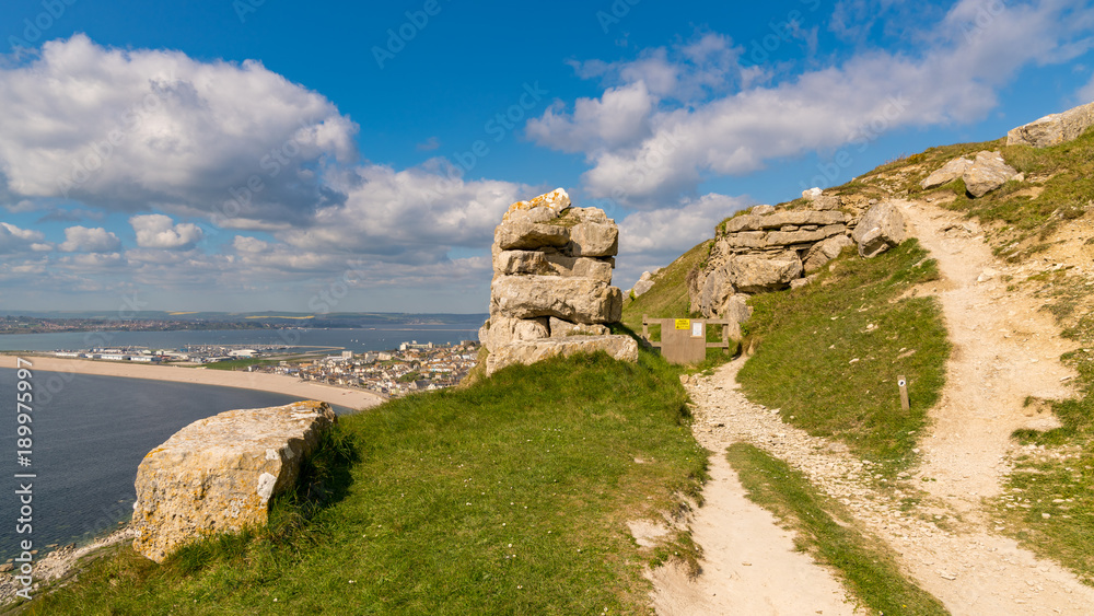 View from the South West Coast Path towards Fortuneswell and Chesil Beach, Isle of Portland, Jurassic Coast, Dorset, UK View from the South West Coast Path towards Fortuneswell and Chesil Beach, Isle of Portland, Jurassic Coast, Dorset, UK
