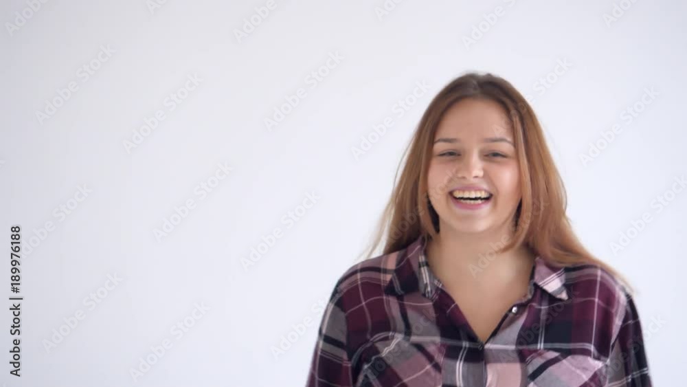 Candid young girl having fun at studio Candid young girl having fun at studio