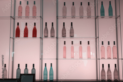 Shelves with bottles of alcohol drinks