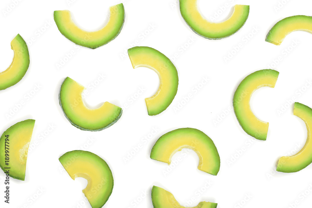 avocado slices isolated on white background. Top view. Flat lay pattern avocado slices isolated on white background. Top view. Flat lay pattern