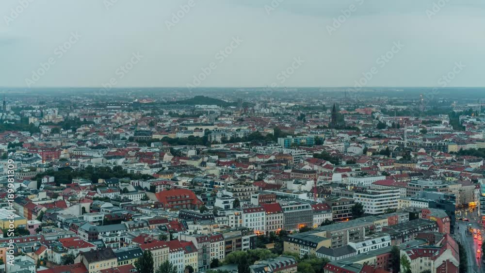 Time lapse panoramic view on Berlin from 37th floor at dusk. The direction of shot is from Alexanderplatz toward south - western Berlin. Time lapse panoramic view on Berlin from 37th floor at dusk. The direction of shot is from Alexanderplatz toward south - western Berlin.