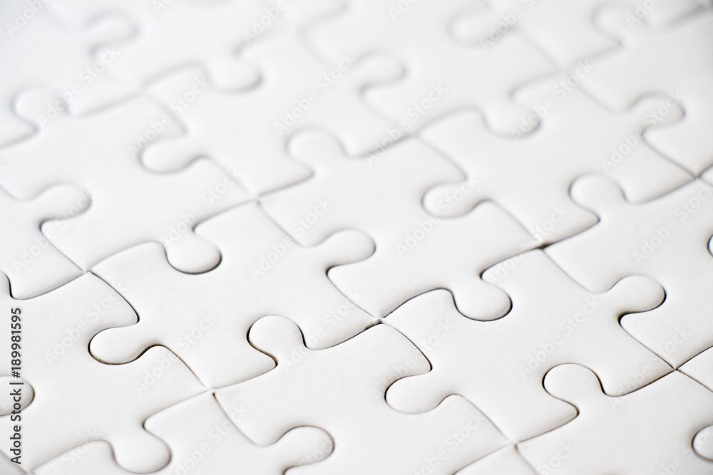Closed up of white plain jigsaw game background Closed up of white plain jigsaw game background