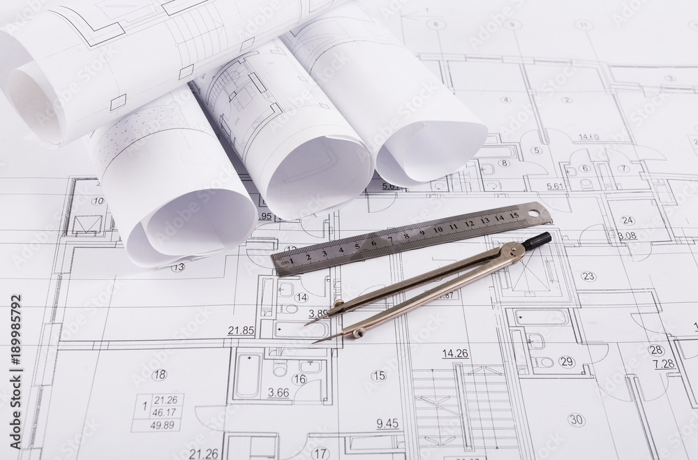 Architectural project, engineering tools on table. Architectural project, engineering tools on table.