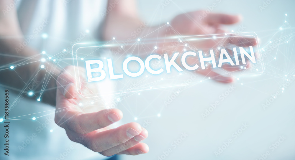 Businessman using blockchain cryptocurrency interface 3D rendering Businessman using blockchain cryptocurrency interface 3D rendering