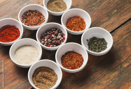 Diverse spices in small cups