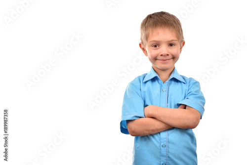 A business boy on a white background. An enchanting little boy.