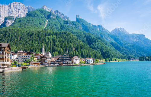 Alleghe, Belluno,italy: a charming mountain village located in a unique natural setting overlooking its fascinating lake , in the geographic heart of the Dolomites UNESCO World Natural Heritage