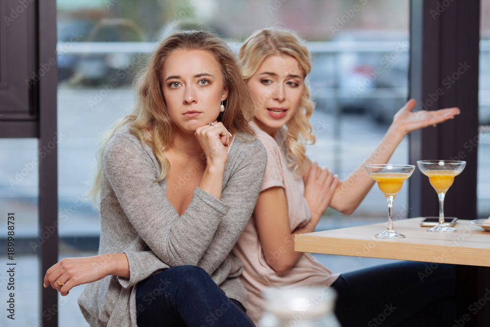 Sad cheerless woman looking at you Sad cheerless woman looking at you