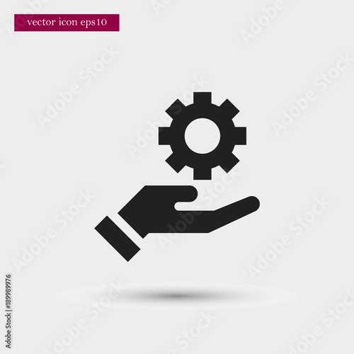 Gear on hand icon simple vector sign