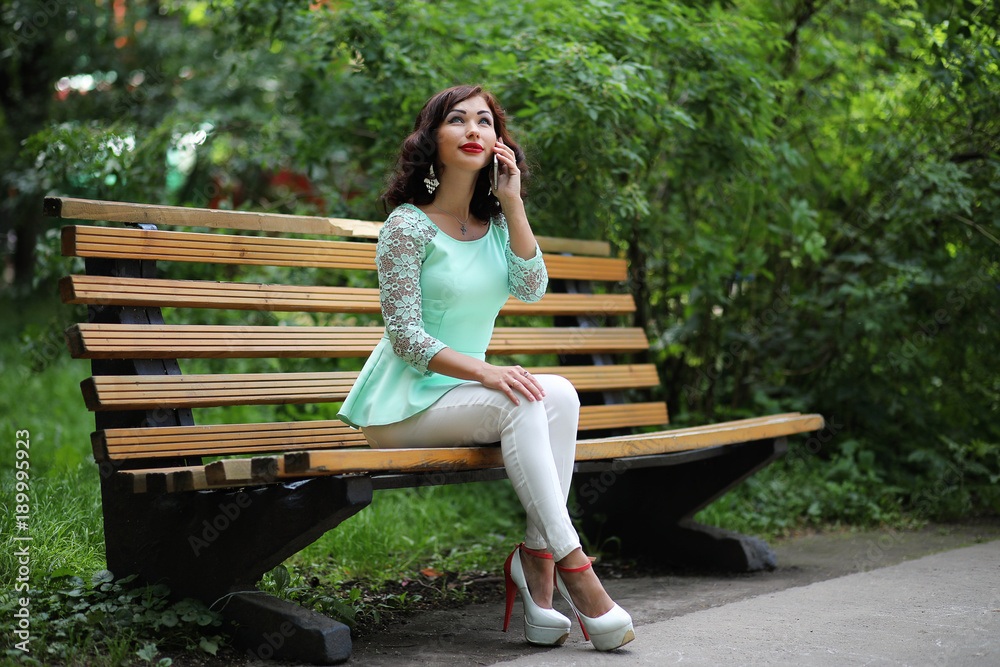 Beautiful girl in a spring leaf park Beautiful girl in a spring leaf park
