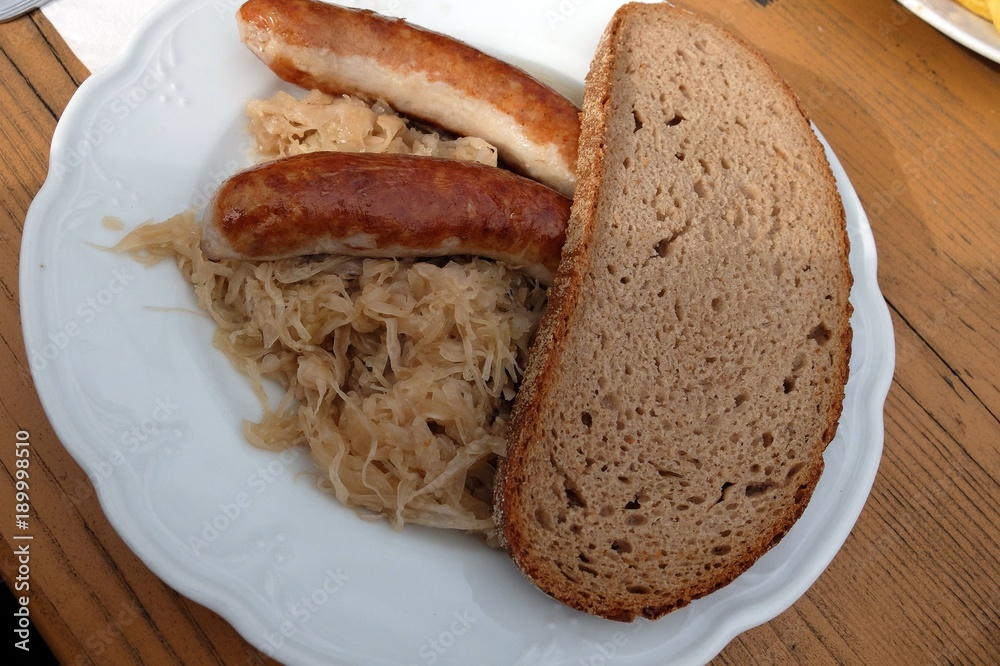 fränkische Bratwürste mit Sauerkraut und Brot Stock Photo | Adobe Stock fränkische Bratwürste mit Sauerkraut und Brot Stock Photo | Adobe Stock