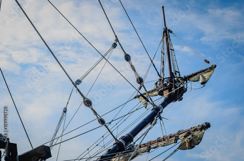 Tall ship bow rigging reaching up to the sky