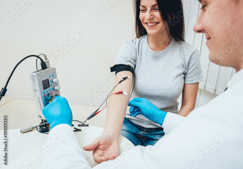 Patient nerves testing using electromyography. EMG photo