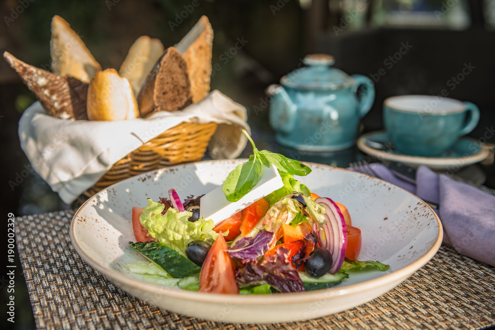 Greek Salad in Plate in Sunrays