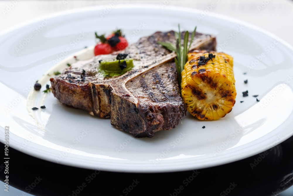 T bone steak. Grilled mexican style meat. Juicy tender pork chop. Simple tasty meal