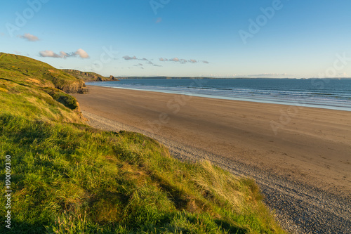 Evening sun over Newgale Beach in Pembrokeshire, Dyfed, Wales, UK