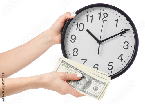 A clock on a female hand and money dollars