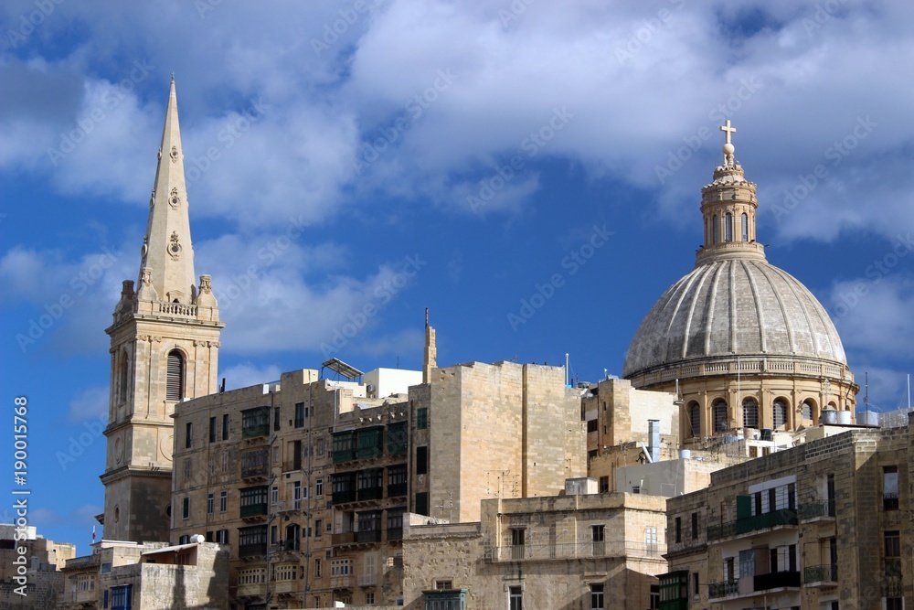 Towers of St. Paul's Anglican cathedral and the Basilica of Our Lady of Mount Carmel, Valletta, Malta.