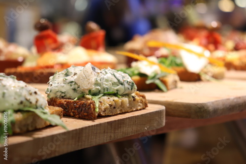 wooden tray of cheese tapas