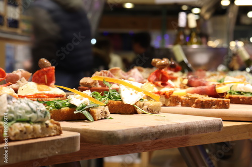 wooden tray of cheese tapas