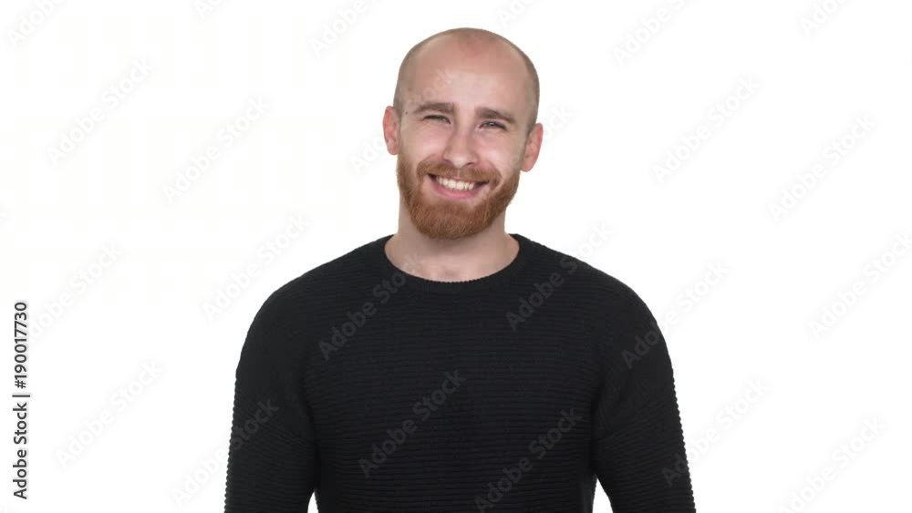 Portrait of pleased man having red beard and mustaches, gesturing on camera alright or OK sign with fingers over white background. Concept of emotions Portrait of pleased man having red beard and mustaches, gesturing on camera alright or OK sign with fingers over white background. Concept of emotions