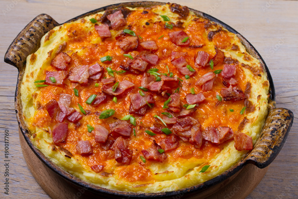 Cheddar Mashed Potato Casserole with Bacon. Baked Cheddar Potato Casserole. horizontal
