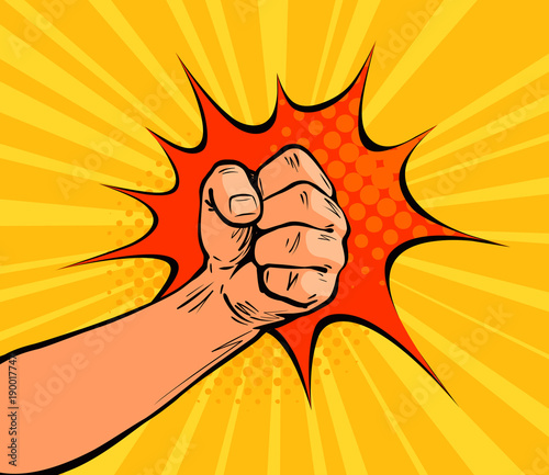 Fist punching, crushing blow or strong punch drawn in pop art retro comic style. Cartoon vector illustration photo