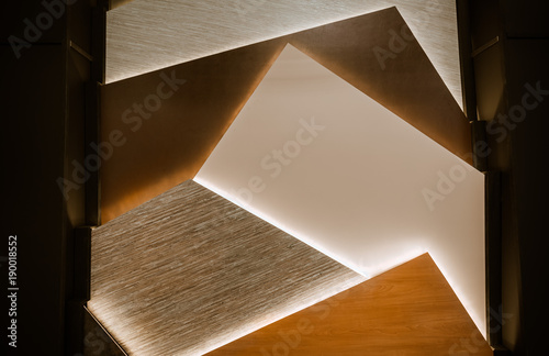 great amazing closeup view of various interior modern, stylish decorative wall panels, highlighted from the back, creating warm, cozy inviting home atmosphere 